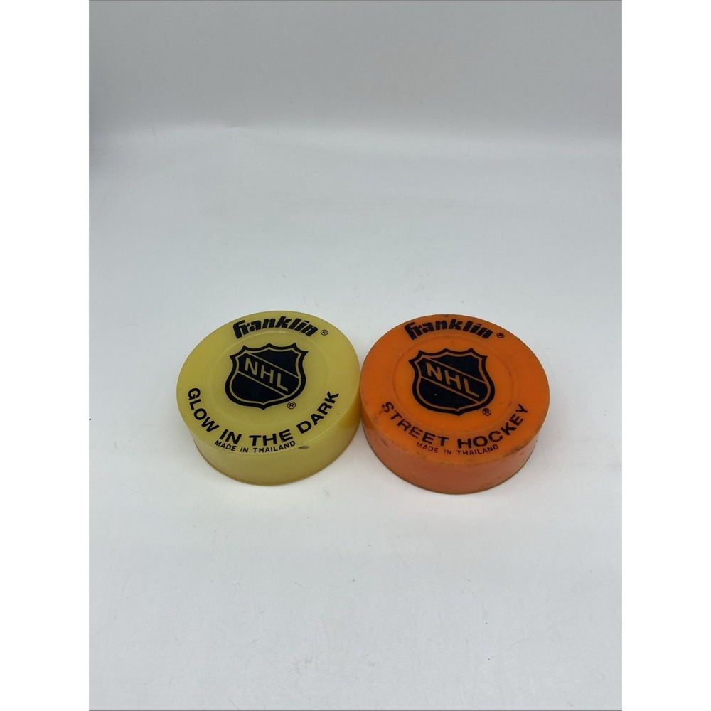 Franklin NHL Street Hockey Pucks Set of 2 Glow in the Dark Orange Yellow Kids